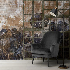 Tapet personalizat leaf cu frunze de monstera albastre vazute printr un cadru metalic pe un fundal caramiziu grunge monstera
