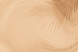 Tapet personalizat leaf cu umbre de frunze de palmier in tonuri calde warm palm shades