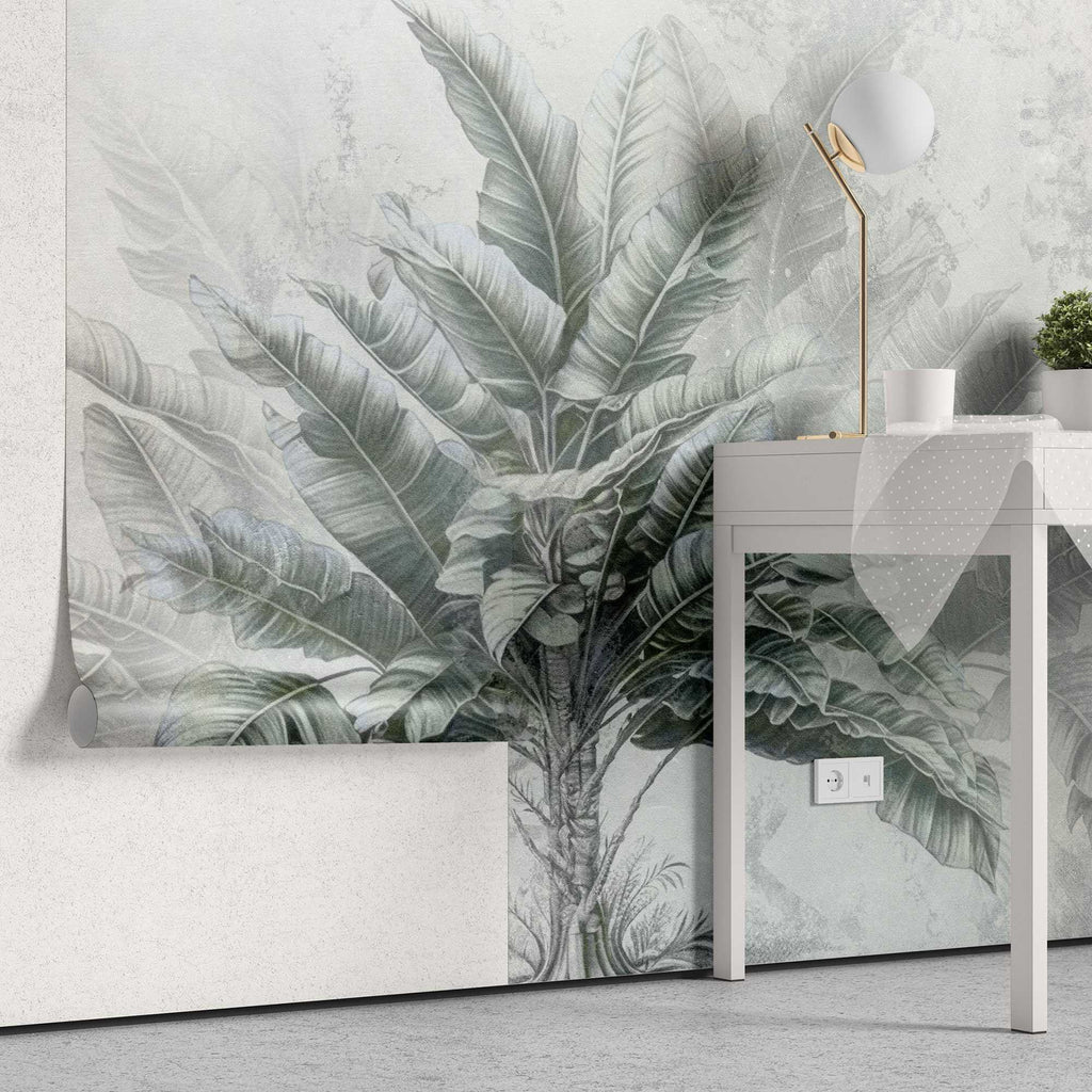 Tapet personalizat leaf cu copac tropical cu frunze in nuante de verde pe un fundal gri deschis dreamy tropical tree