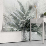 Tapet personalizat leaf cu copac tropical cu frunze in nuante de verde pe un fundal gri deschis dreamy tropical tree