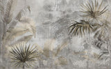 Tapet personalizat leaf cu frunze de palmier si alte plante exotice in tonuri de bej si gri pe un fundal cu aspect de stucada pentru un stil rustic modern gold concrete leaves